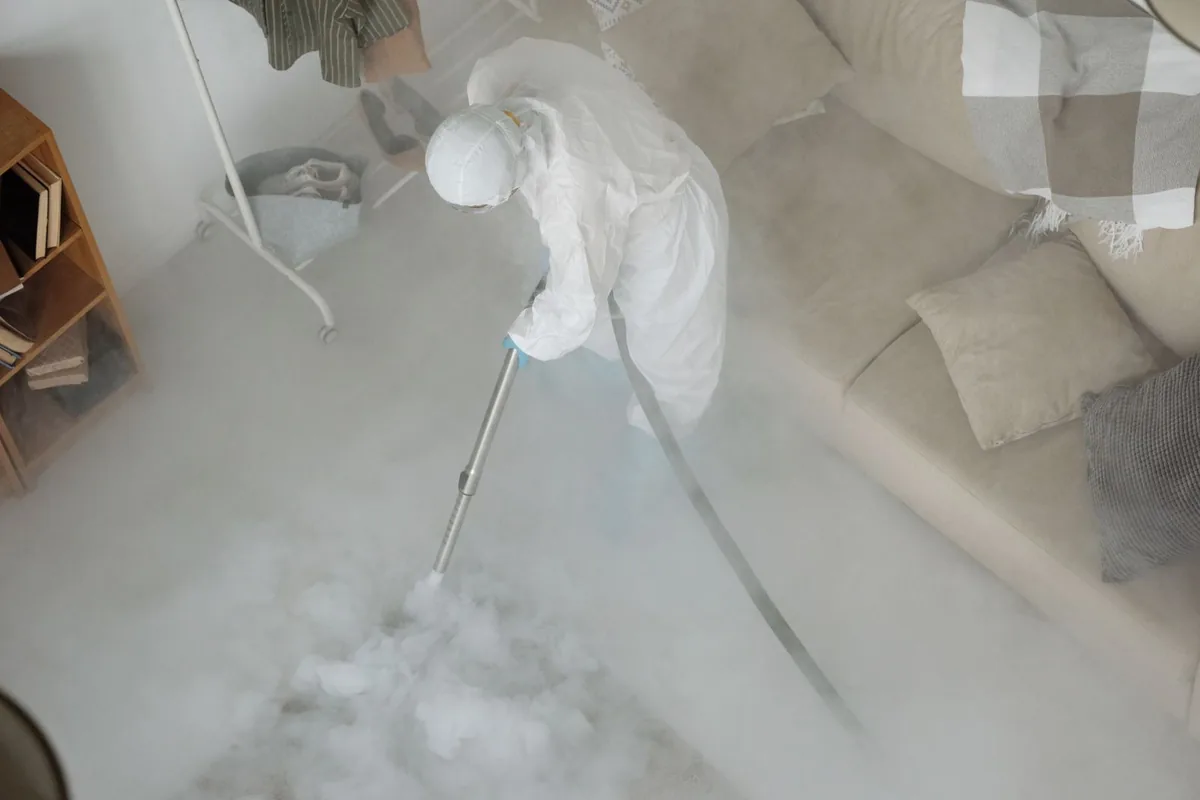Biohazard cleanup technician in protective equipment, Maple Valley, WA